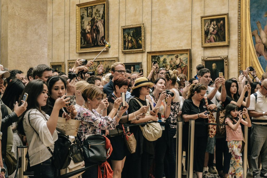 Tourists in the Louvre Museum Paris